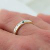 Textured Silver and 18ct Gold Sea Inspired Sapphire Wedding Ring Hand | Lisa Rothwell-Young