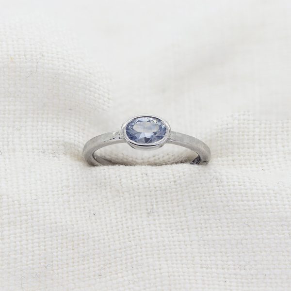 Platinum and pale blue sapphire engagement ring by Lisa Rothwell-Young