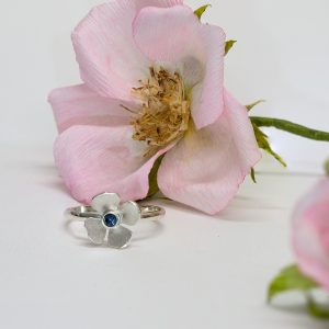 Modern Flora Flower Engagement Ring in white gold with a blue sapphire| Lisa Rothwell-Young