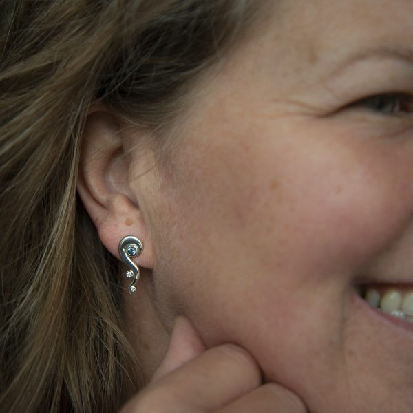 Sea inspired aquamarine and diamond earrings worn | Lisa Rothwell-Young