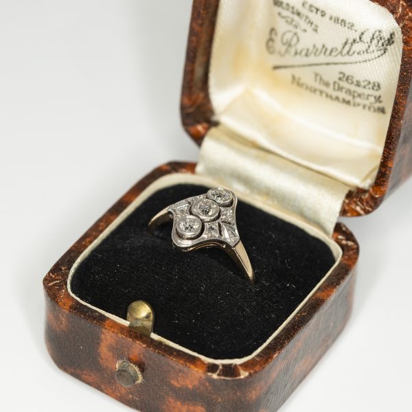 Navette shaped white and yellow gold cluster ring