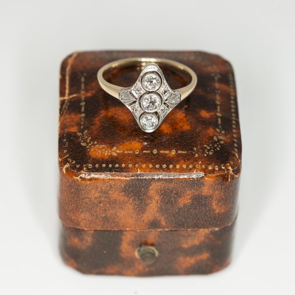 Navette shaped white and yellow gold cluster ring front view