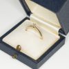 A yellow gold and diamond vintage solitaire ring