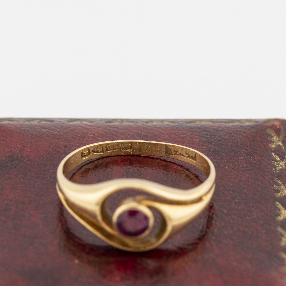 18ct gold and Ruby Swirl Ring hallmark view |Lisa Rothwell-Young