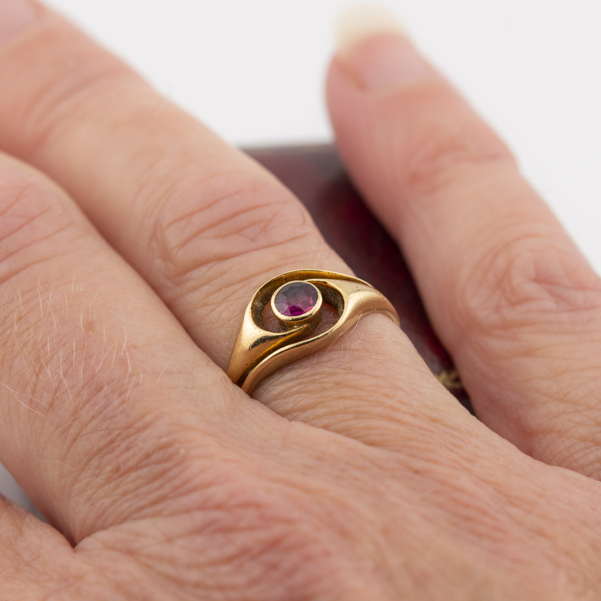 18ct gold and Ruby Swirl Ring worn |Lisa Rothwell-Young